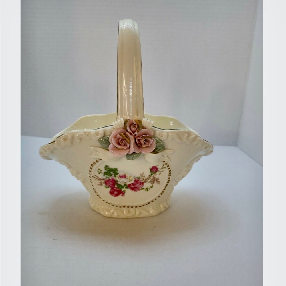 Vintage ceramic basket with roses.